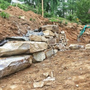 Farmhouse Renovation Rock Retaining Wall - Bryson City Farmhouse